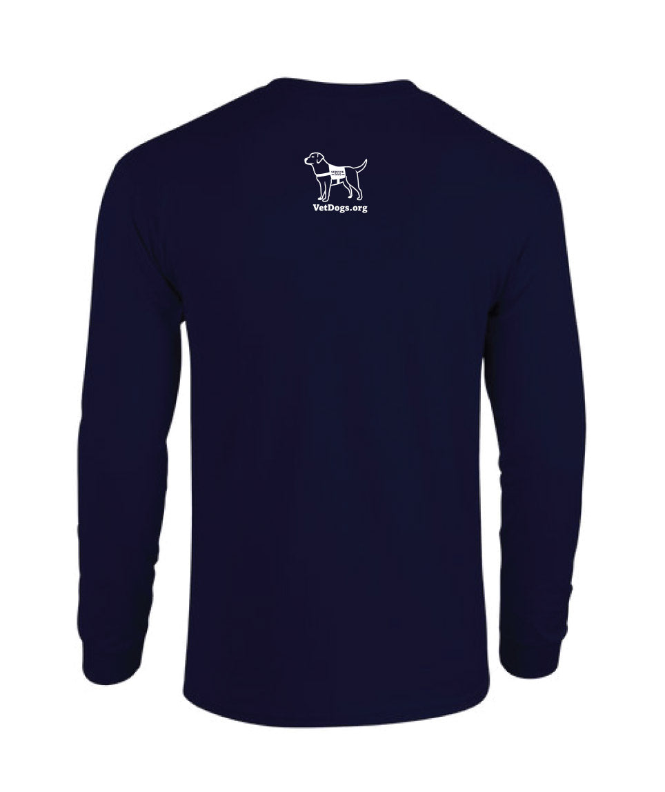 This photo shows a view of the back of the navy blue long sleeved shirt. There is a white image of a dog on the center top of the shirt. the dog is wearing a service dog vest. below the image of the dog is text that says, "VetDogs.org"