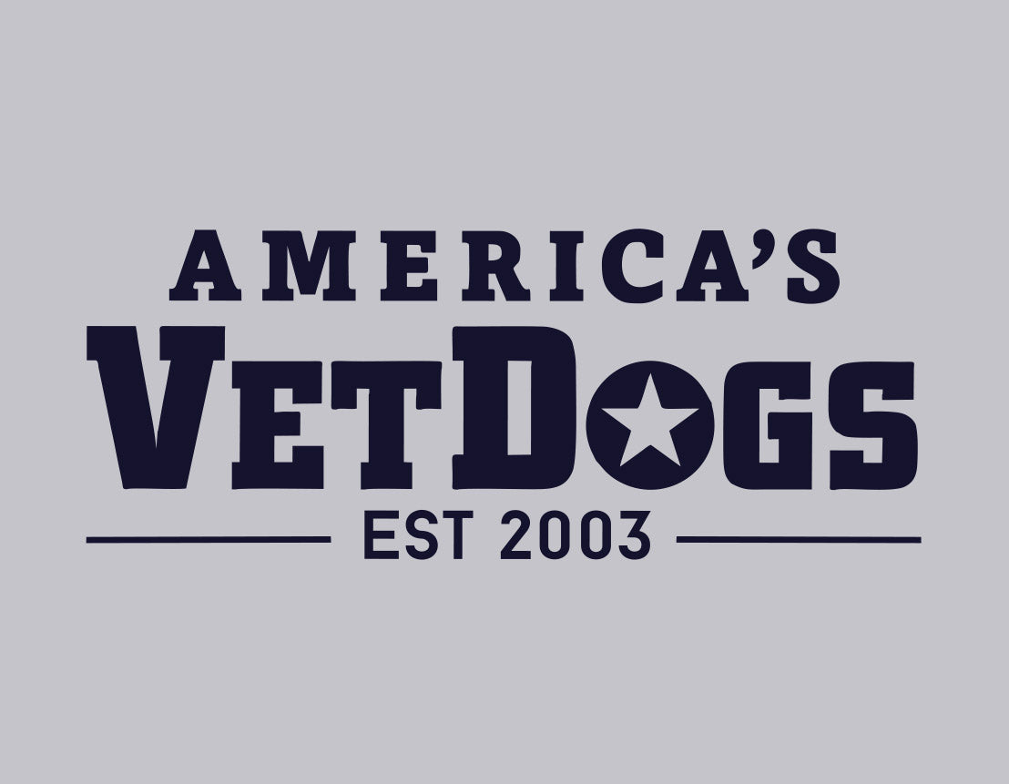 image shows an up close shot of the America's VetDogs lettering that is found on the front of the sweatshirt. the image in navy blue lettering and says "America's VetDogs EST 2003"