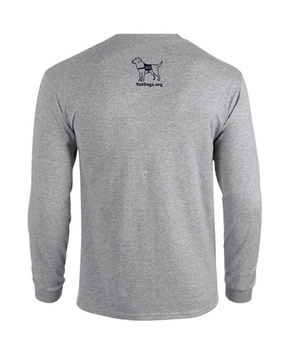 This photo show a view of the back of the grey long sleeved  shirt. There is a navy blue image of a dog on the center top of the shirt. the dog is wearing a service dog vest. below the image of the dog is text that says, "VetDogs.org"