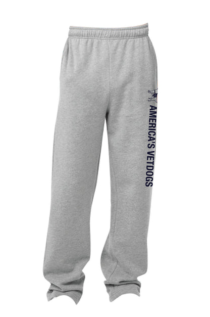 Image of grey sweatpants with no elastic band at the ankle with a white America's VetDogs logo dog on the left hip with "AMERICA'S VETDOGS" down the side of the left leg. 